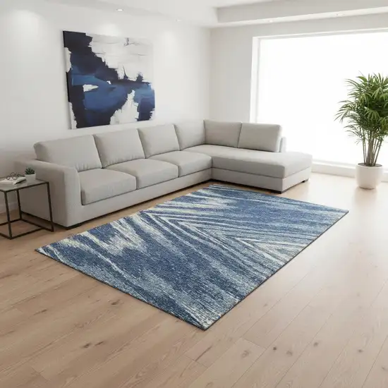 Blue And Ivory Abstract Washable Area Rug With UV Protection Photo 2