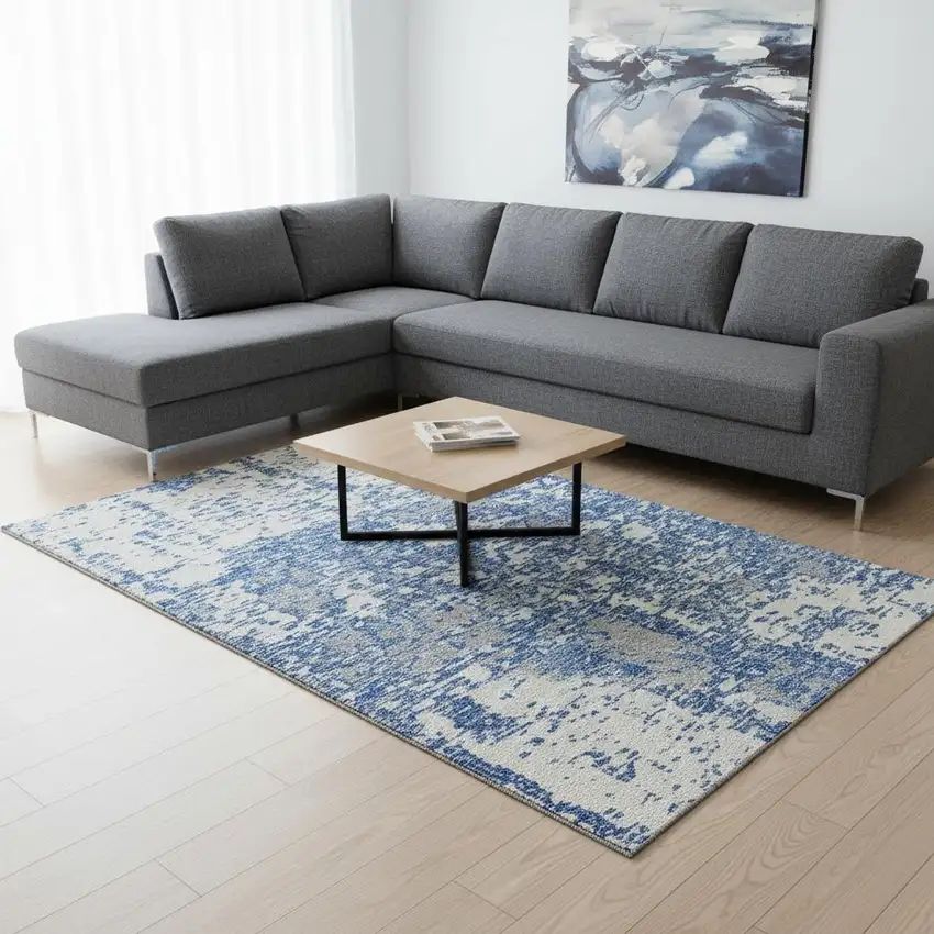 Blue And Ivory Abstract Washable Area Rug With UV Protection Photo 2