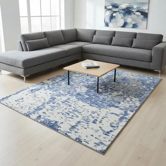 Blue And Ivory Abstract Washable Area Rug With UV Protection Photo 2