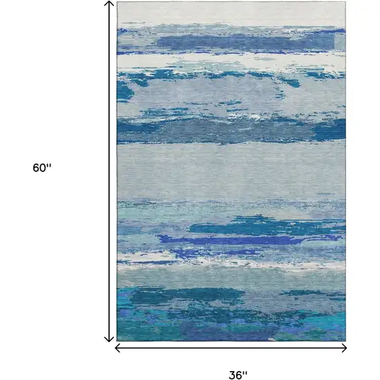 Blue And Ivory Abstract Washable Area Rug With UV Protection Photo 3