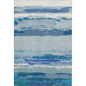 Photo of Blue And Ivory Abstract Washable Area Rug With UV Protection