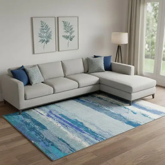 Blue And Ivory Abstract Washable Area Rug With UV Protection Photo 2