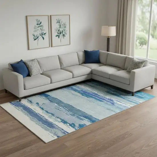 Blue And Ivory Abstract Washable Area Rug With UV Protection Photo 2