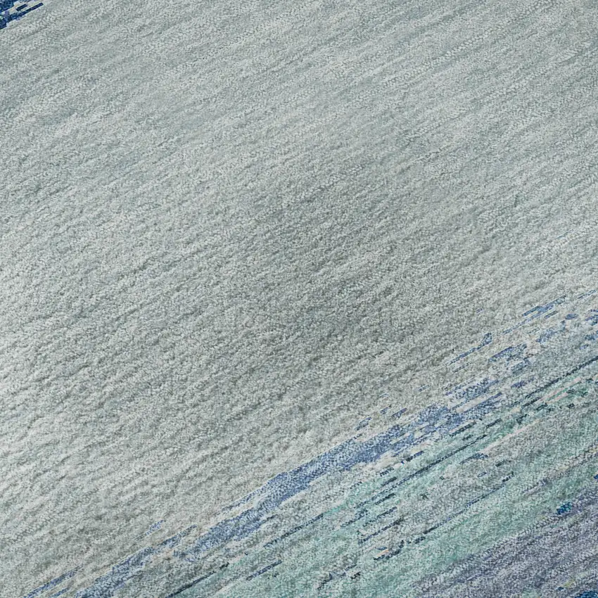 Blue And Ivory Abstract Washable Area Rug With UV Protection Photo 9