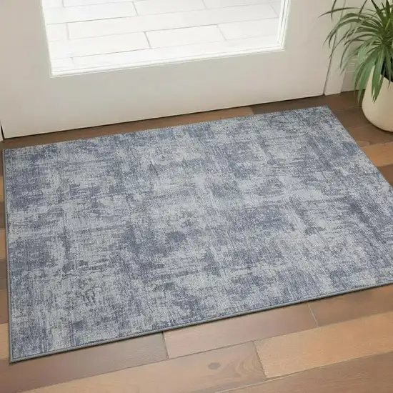 Blue And Ivory Abstract Washable Area Rug With UV Protection Photo 2