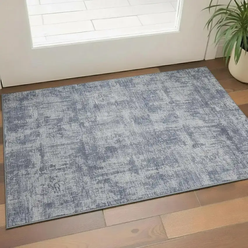 Blue And Ivory Abstract Washable Area Rug With UV Protection Photo 2