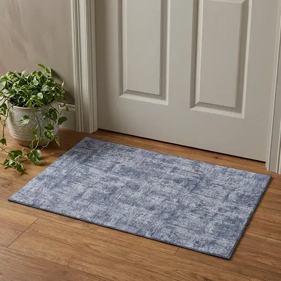 Blue And Ivory Abstract Washable Area Rug With UV Protection Photo 1