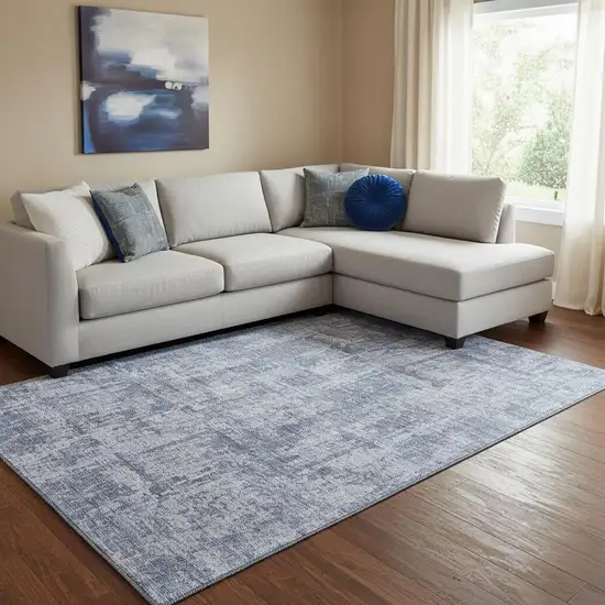 Blue And Ivory Abstract Washable Area Rug With UV Protection Photo 2