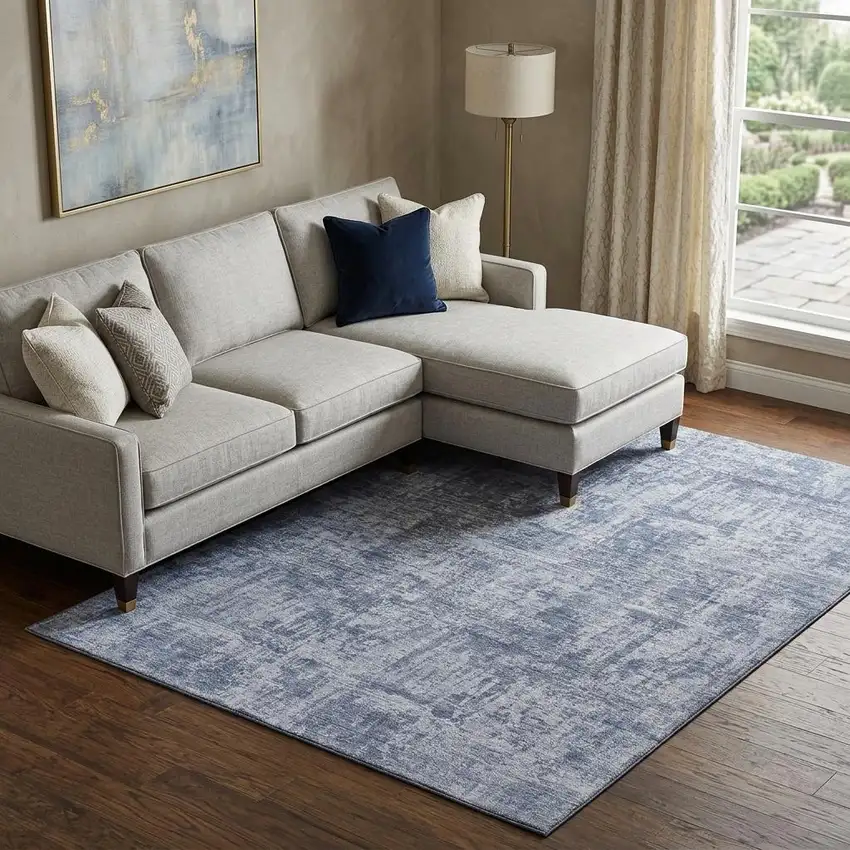 Blue And Ivory Abstract Washable Area Rug With UV Protection Photo 1