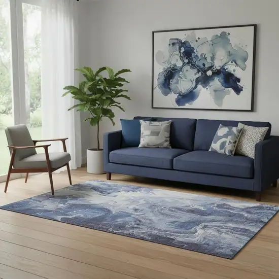 Blue And Ivory Abstract Washable Area Rug With UV Protection Photo 2