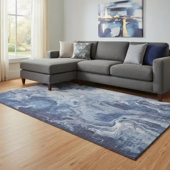 Blue And Ivory Abstract Washable Area Rug With UV Protection Photo 2
