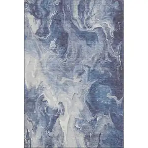 Photo of Blue And Ivory Abstract Washable Area Rug With UV Protection