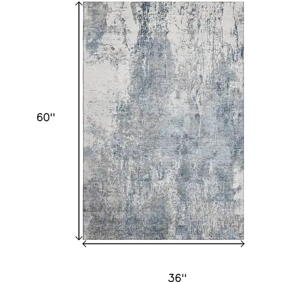 Blue And Ivory Abstract Washable Area Rug With UV Protection Photo 9
