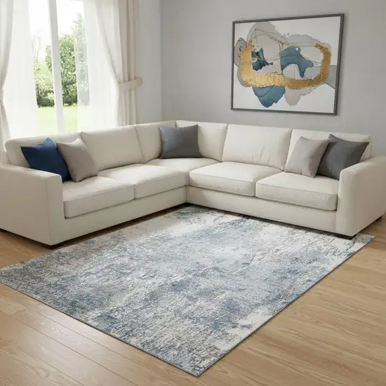 Blue And Ivory Abstract Washable Area Rug With UV Protection Photo 2