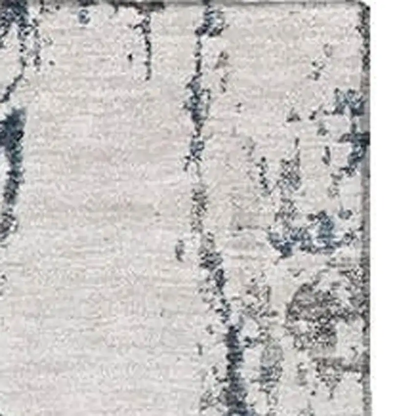 Blue And Ivory Abstract Washable Area Rug With UV Protection Photo 2