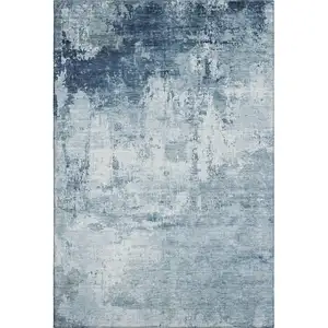 Photo of Blue And Ivory Abstract Washable Area Rug With UV Protection
