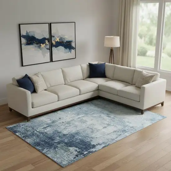 Blue And Ivory Abstract Washable Area Rug With UV Protection Photo 2