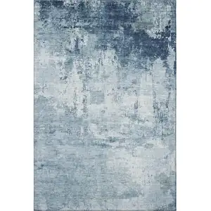 Photo of Blue And Ivory Abstract Washable Area Rug With UV Protection