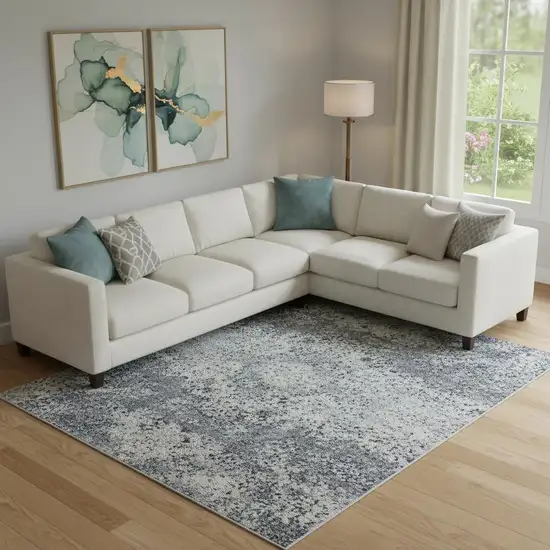 Blue And Ivory Abstract Washable Area Rug With UV Protection Photo 2