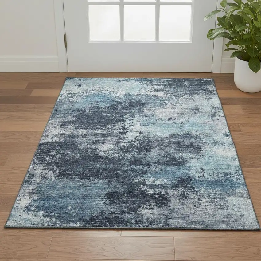 Blue And Ivory Abstract Washable Area Rug With UV Protection Photo 2