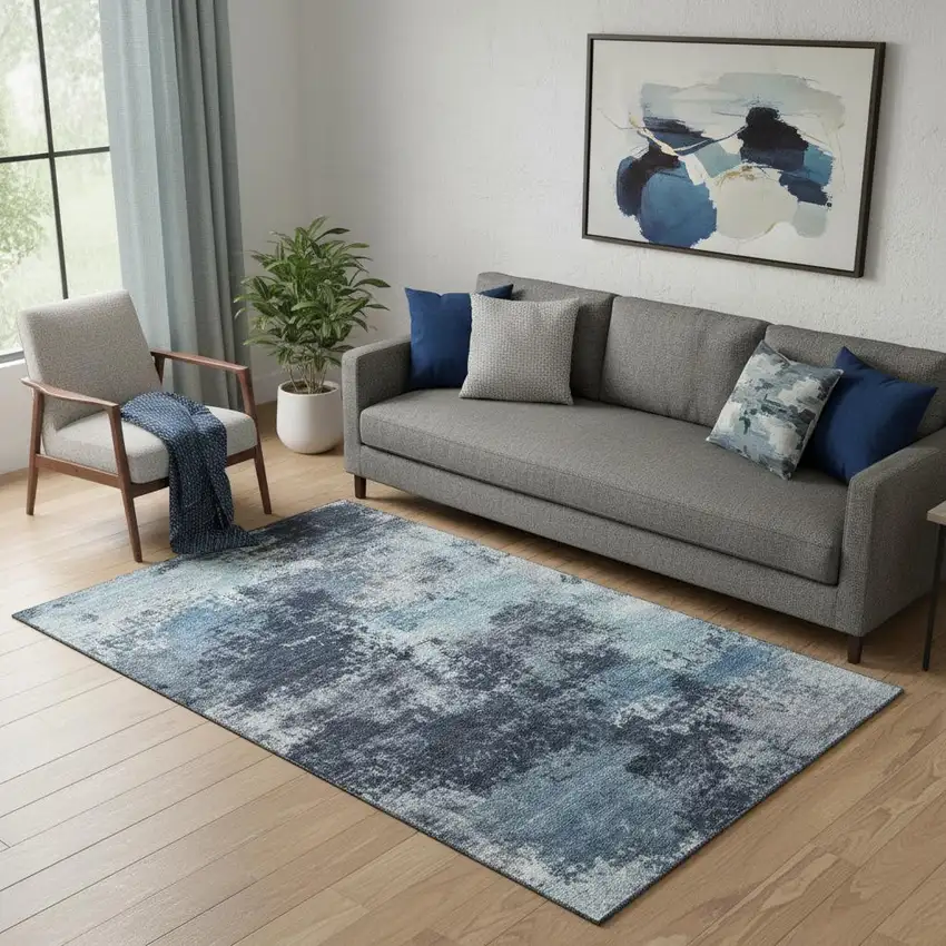 Blue And Ivory Abstract Washable Area Rug With UV Protection Photo 1