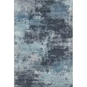 Photo of Blue And Ivory Abstract Washable Area Rug With UV Protection