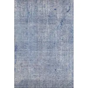 Photo of Blue And Ivory Abstract Washable Area Rug With UV Protection