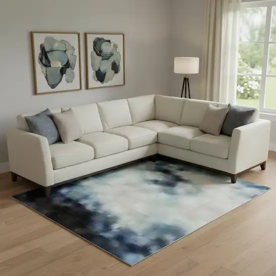 Blue And Ivory Abstract Washable Area Rug With UV Protection Photo 2