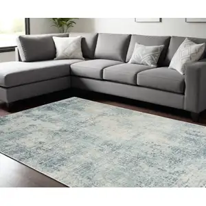 Photo of Blue And Ivory Abstract Washable Area Rug