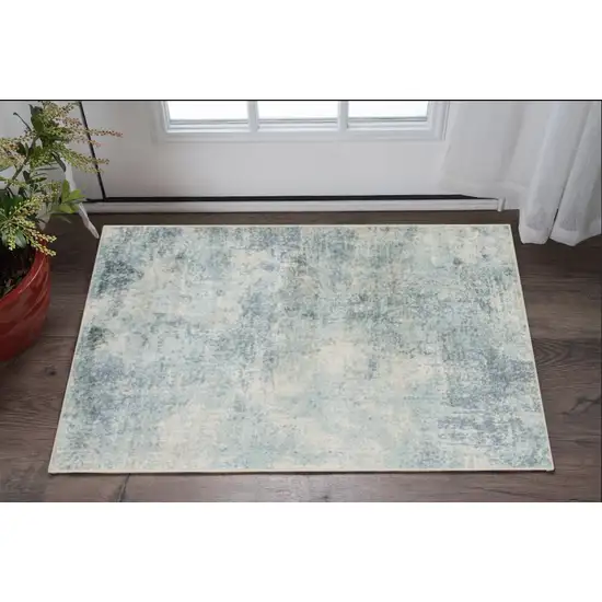 Blue And Ivory Abstract Washable Area Rug Photo 1