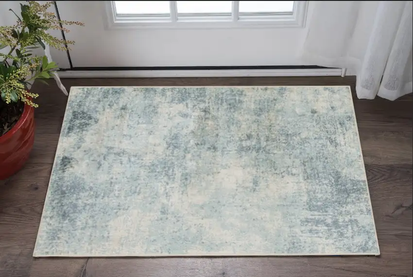 Blue And Ivory Abstract Washable Area Rug Photo 1