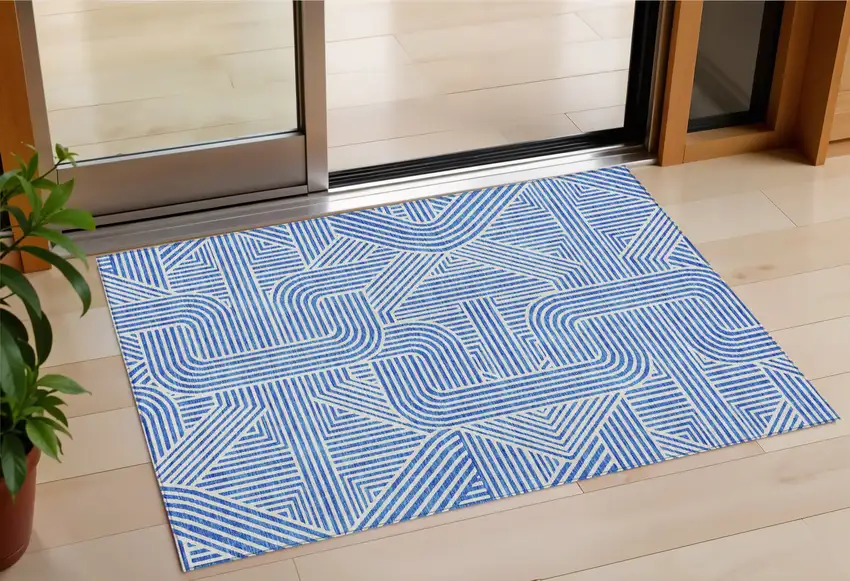 Blue And Ivory Abstract Washable Indoor Outdoor Area Rug Photo 1