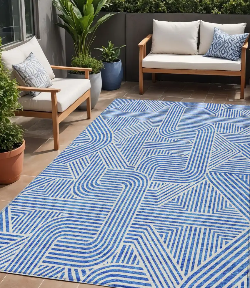 Blue And Ivory Abstract Washable Indoor Outdoor Area Rug Photo 1
