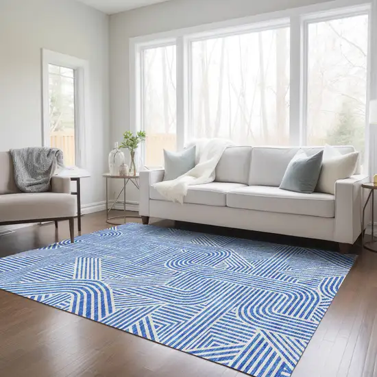 Blue And Ivory Abstract Washable Indoor Outdoor Area Rug Photo 9