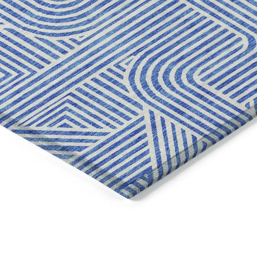 Blue And Ivory Abstract Washable Indoor Outdoor Area Rug Photo 4