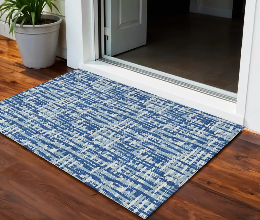 Blue And Ivory Abstract Washable Indoor Outdoor Area Rug Photo 1