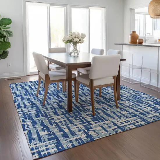 Blue And Ivory Abstract Washable Indoor Outdoor Area Rug Photo 9