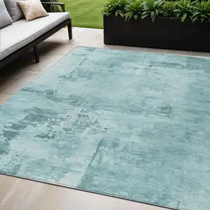 Photo of Blue And Ivory Abstract Washable Indoor Outdoor Area Rug