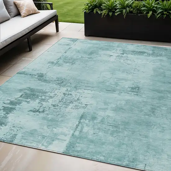 Blue And Ivory Abstract Washable Indoor Outdoor Area Rug Photo 1