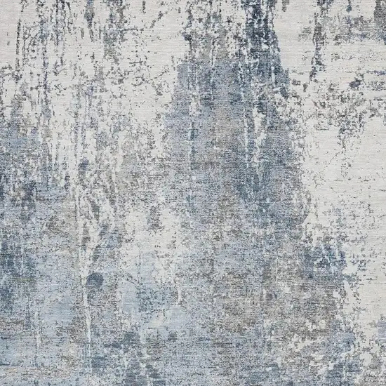 Blue And Ivory Abstract Washable Indoor Outdoor Area Rug Photo 3