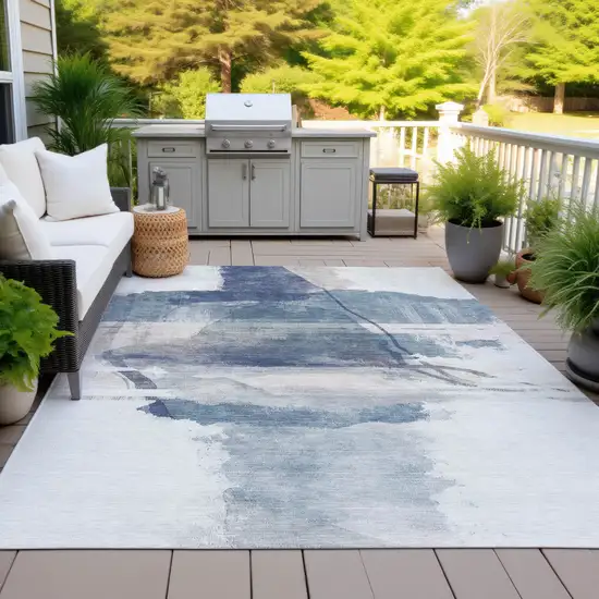 Blue And Ivory Abstract Washable Indoor Outdoor Area Rug Photo 4