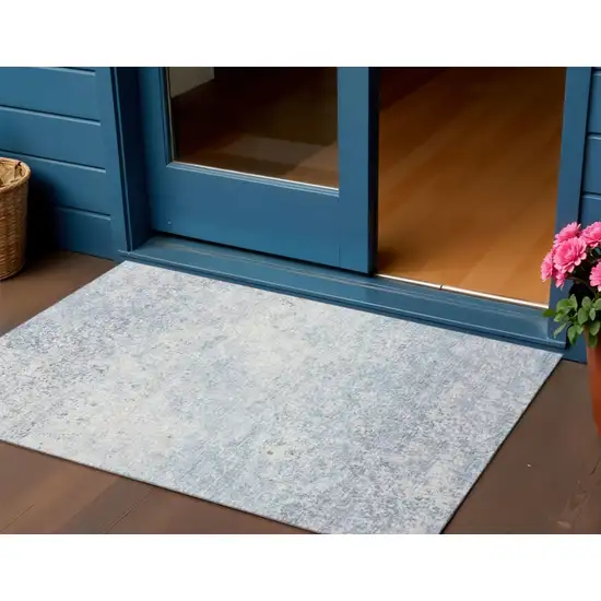 Blue And Ivory Abstract Washable Indoor Outdoor Area Rug Photo 1