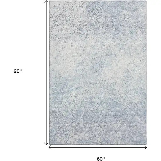 Blue And Ivory Abstract Washable Indoor Outdoor Area Rug Photo 3