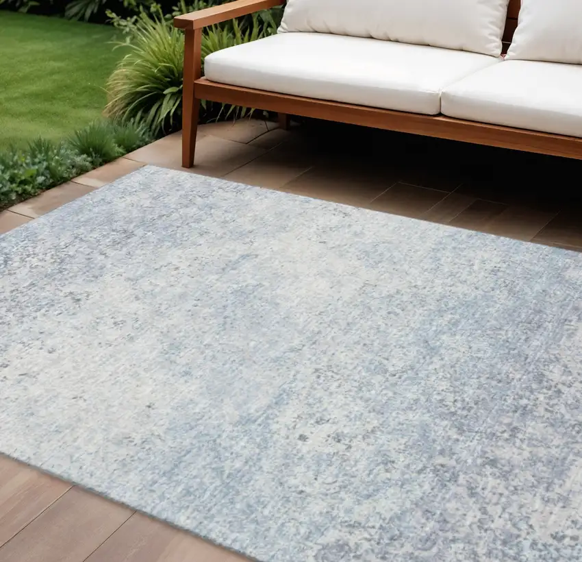 Blue And Ivory Abstract Washable Indoor Outdoor Area Rug Photo 1