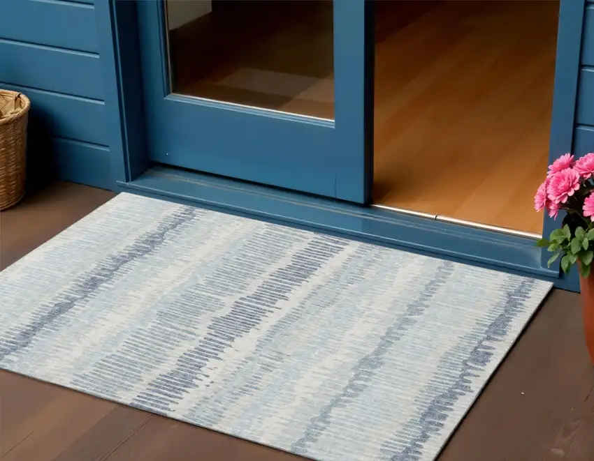 Blue And Ivory Abstract Washable Indoor Outdoor Area Rug Photo 1