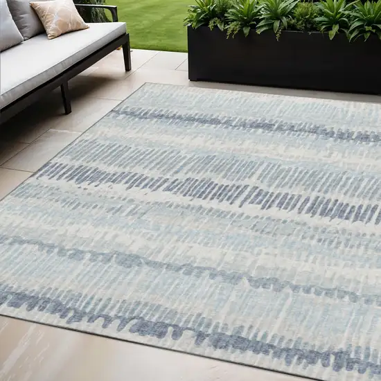 Blue And Ivory Abstract Washable Indoor Outdoor Area Rug Photo 1