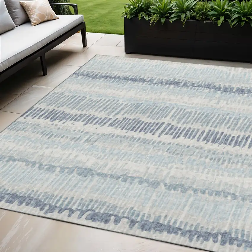 Blue And Ivory Abstract Washable Indoor Outdoor Area Rug Photo 1