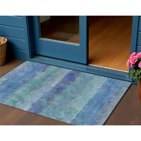 Blue And Ivory Abstract Washable Indoor Outdoor Area Rug Photo 1