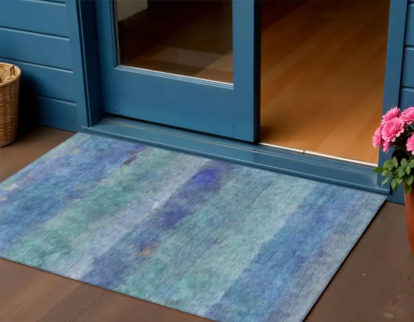 Blue And Ivory Abstract Washable Indoor Outdoor Area Rug Photo 1