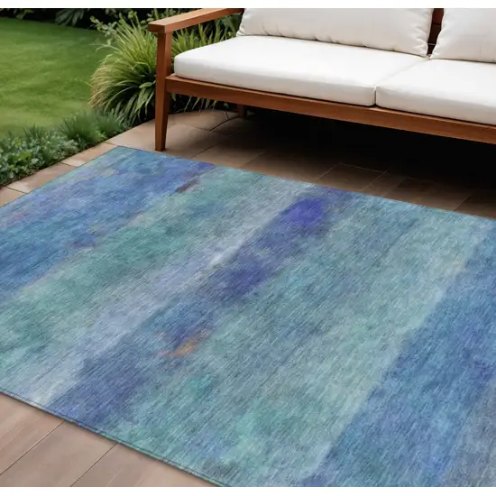 Blue And Ivory Abstract Washable Indoor Outdoor Area Rug Photo 1